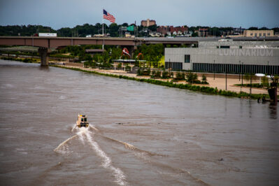 A survey watercraft assigned to the U.S. Army Corps of Engineers, Omaha District, collects water surface elevation data along the Missouri River near downtown Omaha, Nebraska, June 27, 2024. The team is collecting data as a precautionary measure against flood waters in June 2024 from the Missouri River.