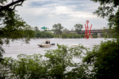 A survey watercraft assigned to the U.S. Army Corps of Engineers, Omaha District, collects water surface elevation data along the Missouri River near downtown Omaha, Nebraska, June 27, 2024. The team is collecting data as a precautionary measure against flood waters in June 2024 from the Missouri River.